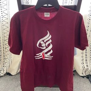Burgundy 100% cotton shirt with Indian symbol